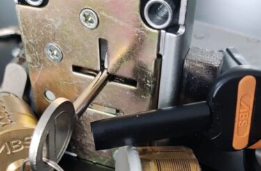 Local locksmith in Stockbridge repairing door lock