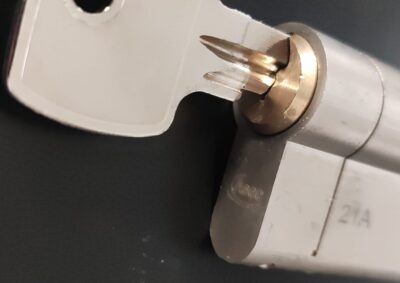 Local locksmith in Stockbridge repairing door lock